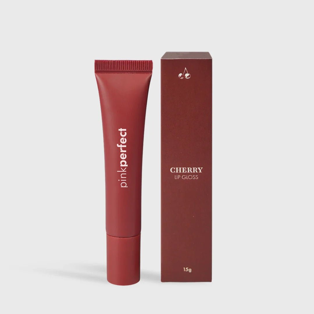 Gloss labial cereja, embalagem vermelha ao lado da caixa, 15g, para hidratação dos lábios.